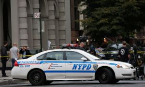NYPD cars outside the apartment