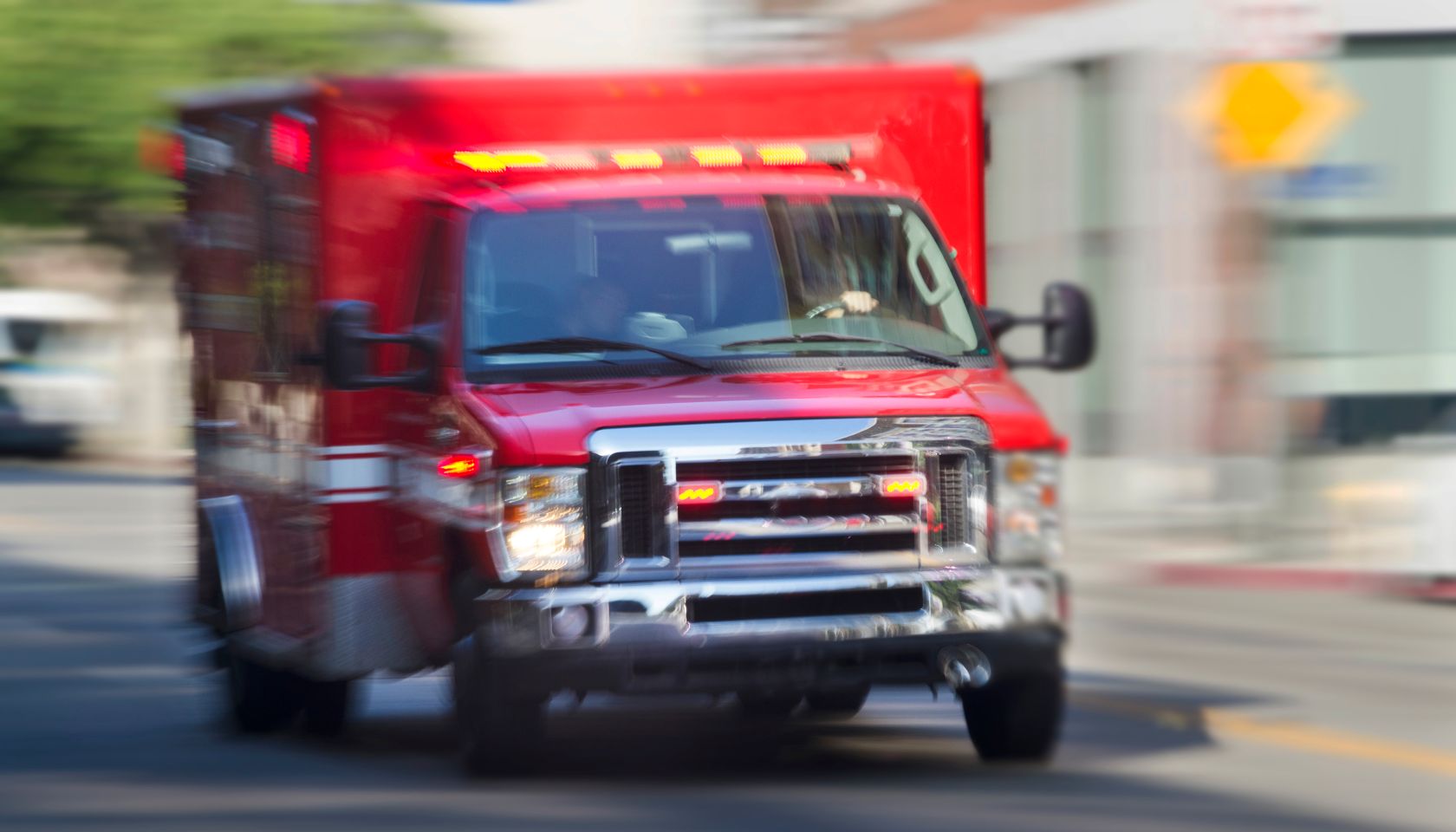 Ambulance hurrying through city streets