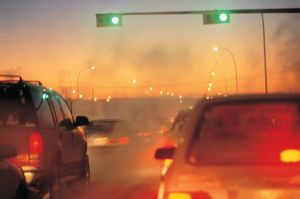 Traffic jam in early evening with exhaust