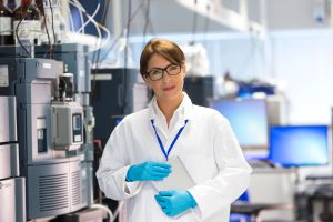 Professionals Female in Lab with Specialist Scientific Equipment