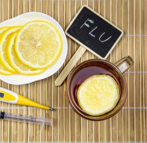 Hot tea, Capsules and pills and Digital medical thermometer. Medical concept