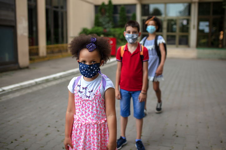 Young Students on School Campus Wearing Medical Face Masks