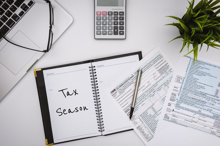 Tax Season. Tax Financial Planning. Form 1040 on Working Desk.