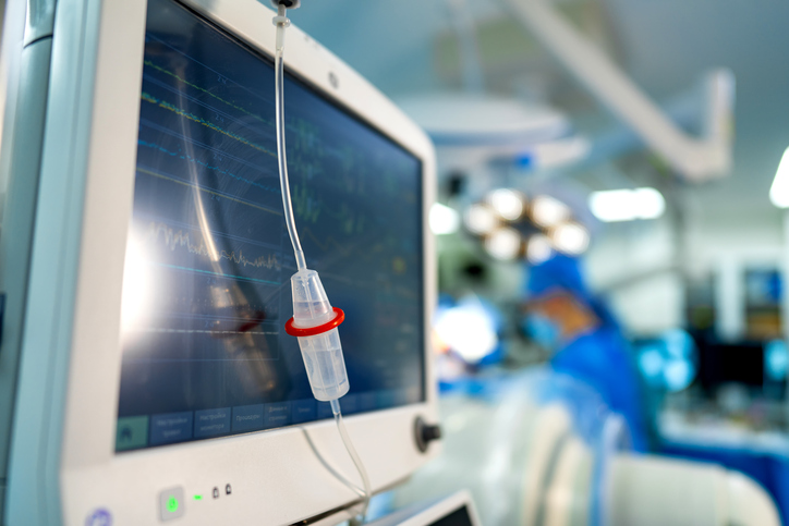A medical device hooked up to a monitor. A Modern Medical Device Monitoring Neurosurgery