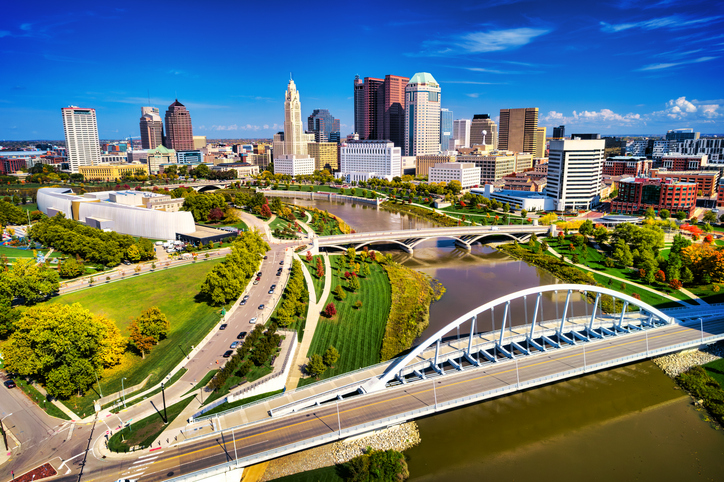 Columbus Downtown Aerial With Bridge, River, And Parks During Autumn