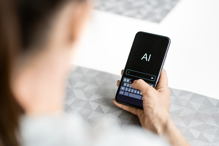 AI generate content with prompt or search in phone. Write text with chat app or chatbot. Woman using artificial intelligence at work or home.